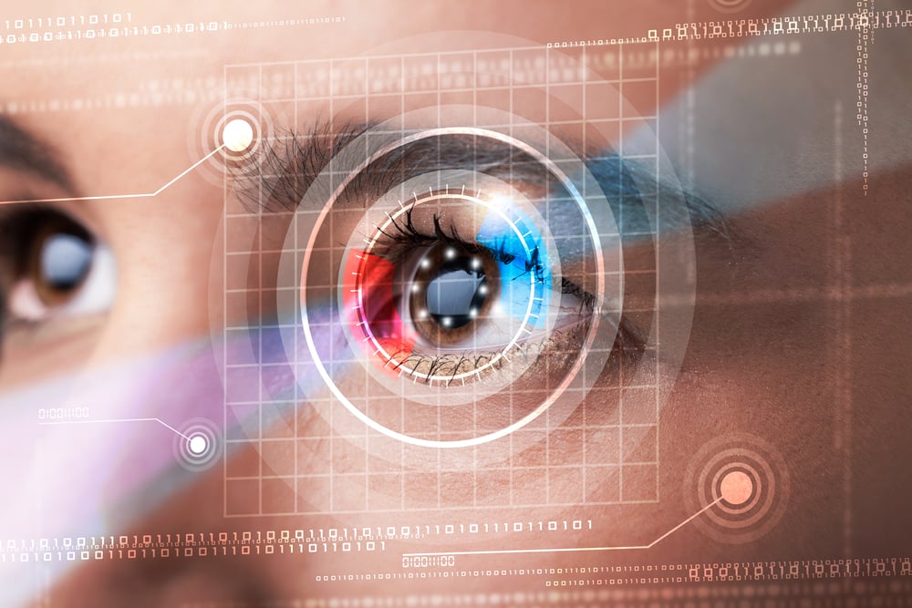 Modern cyber woman with technolgy eye looking